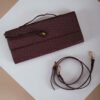 COMODE Burgundy Woven Clutch