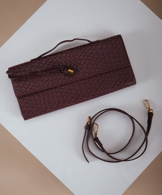 COMODE Burgundy Woven Clutch