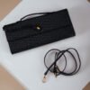 COMODE Black Woven Clutch