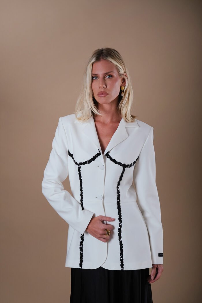 COMODE X KVARIANI White Blazer with Black ruffle details
