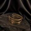 NOIR Gold Crisscross Bracelet