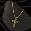 NOIR cross with green details