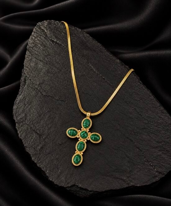 NOIR cross with green details