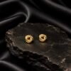 NOIR Gold knot Earrings