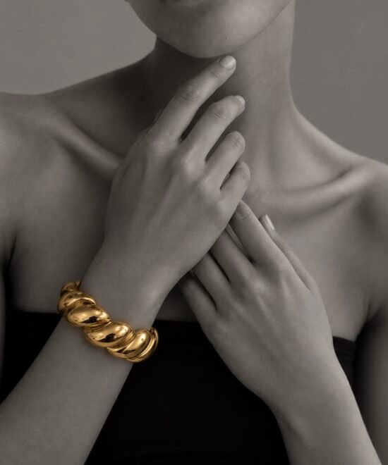 Alternative view of NOIR Gold Spiral Bracelet