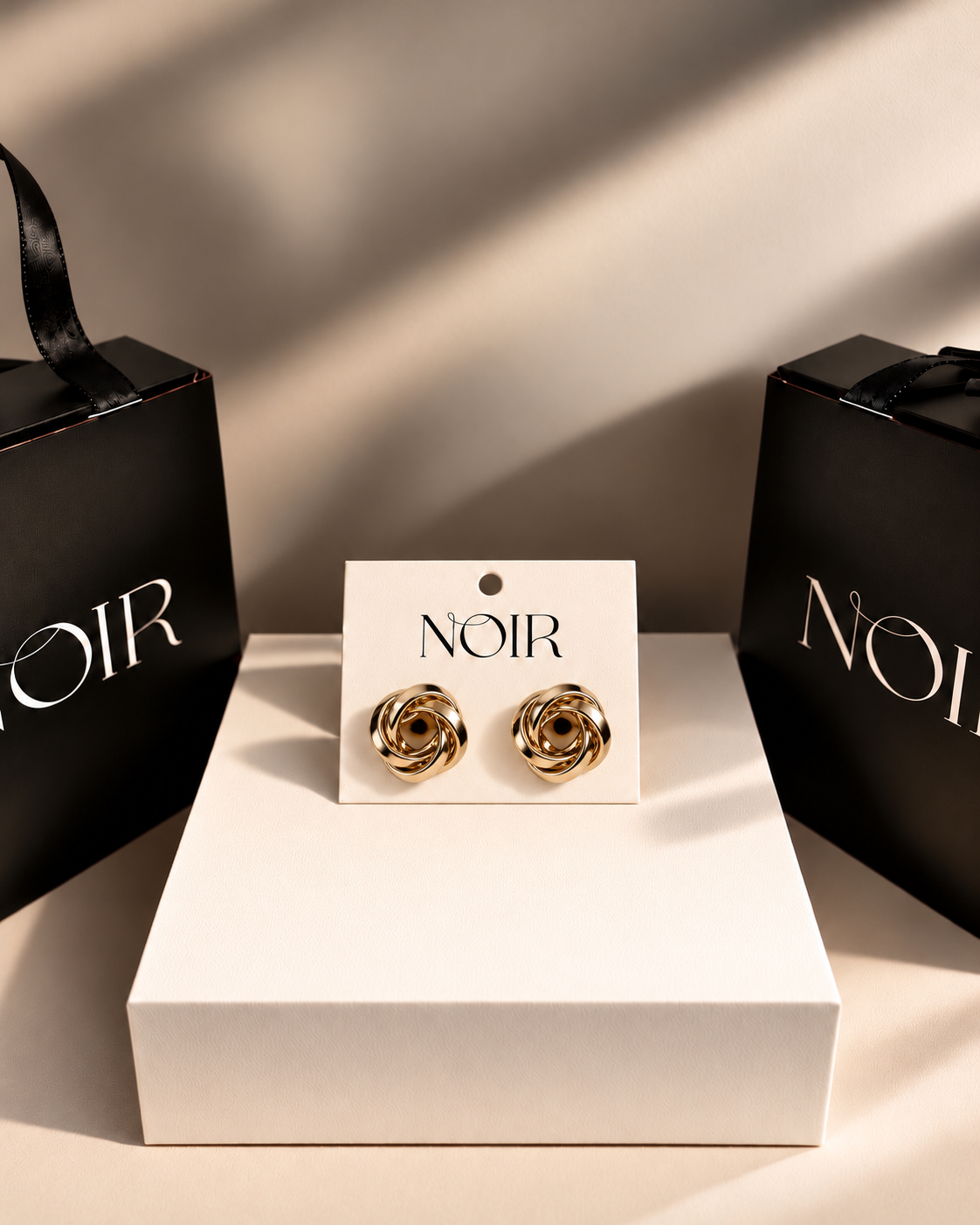 NOIR Gold knot Earrings - Image 3
