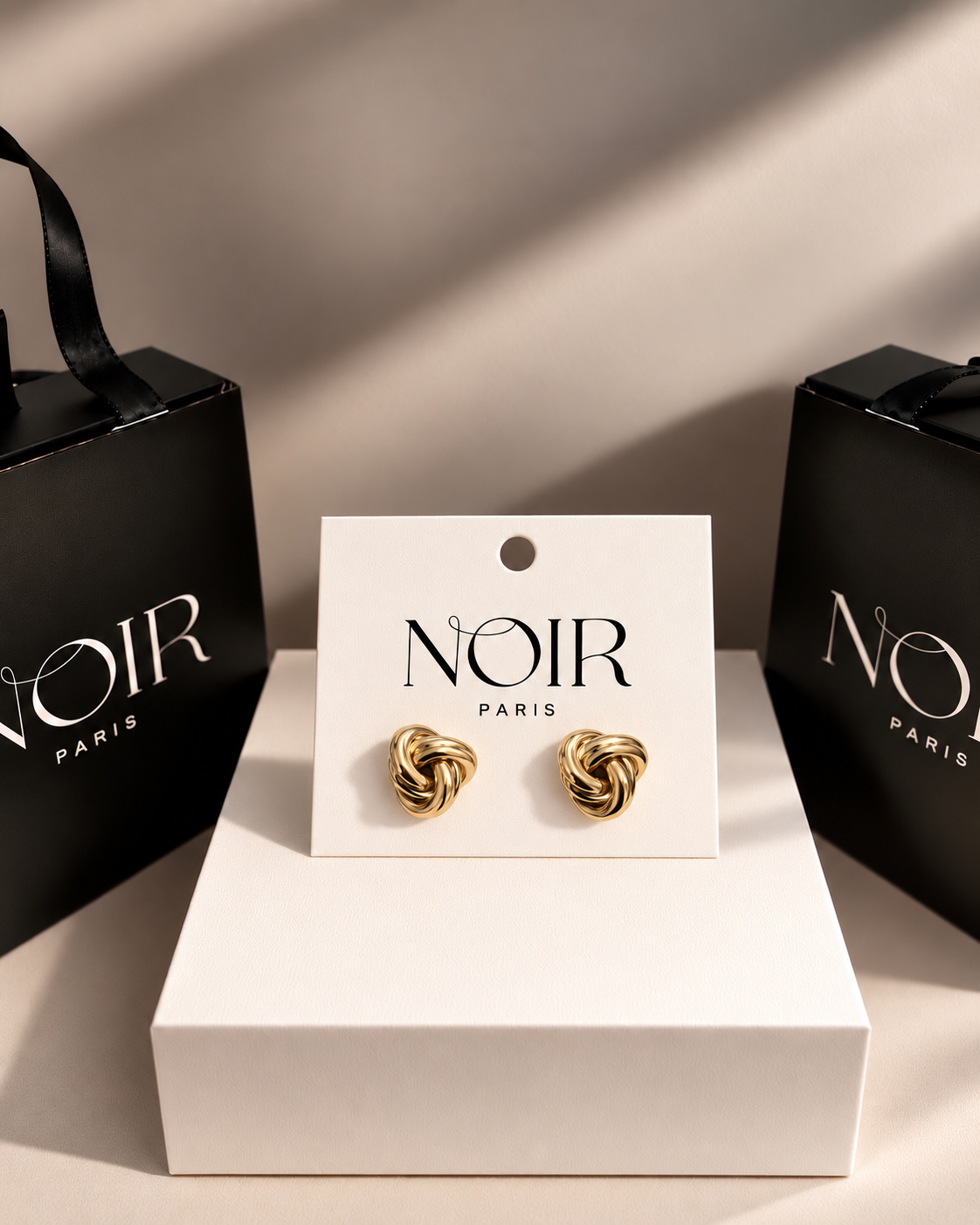 NOIR Gold Knot Earrings - Image 3