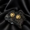 NOIR gold stud earrings
