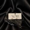 NOIR Tiny Pearl earrings